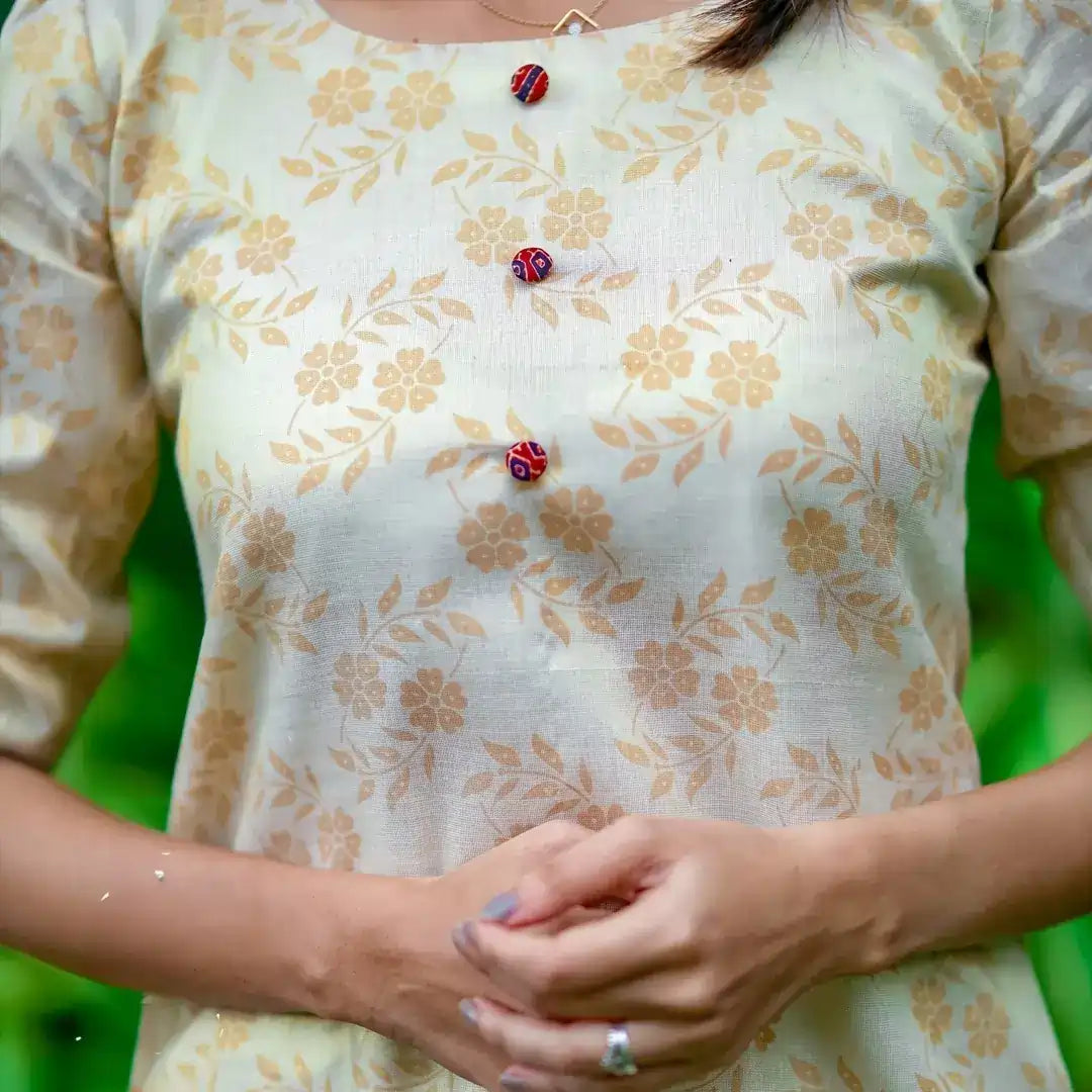golden-kasavu-kurti-with-decorative-buttons-for-women