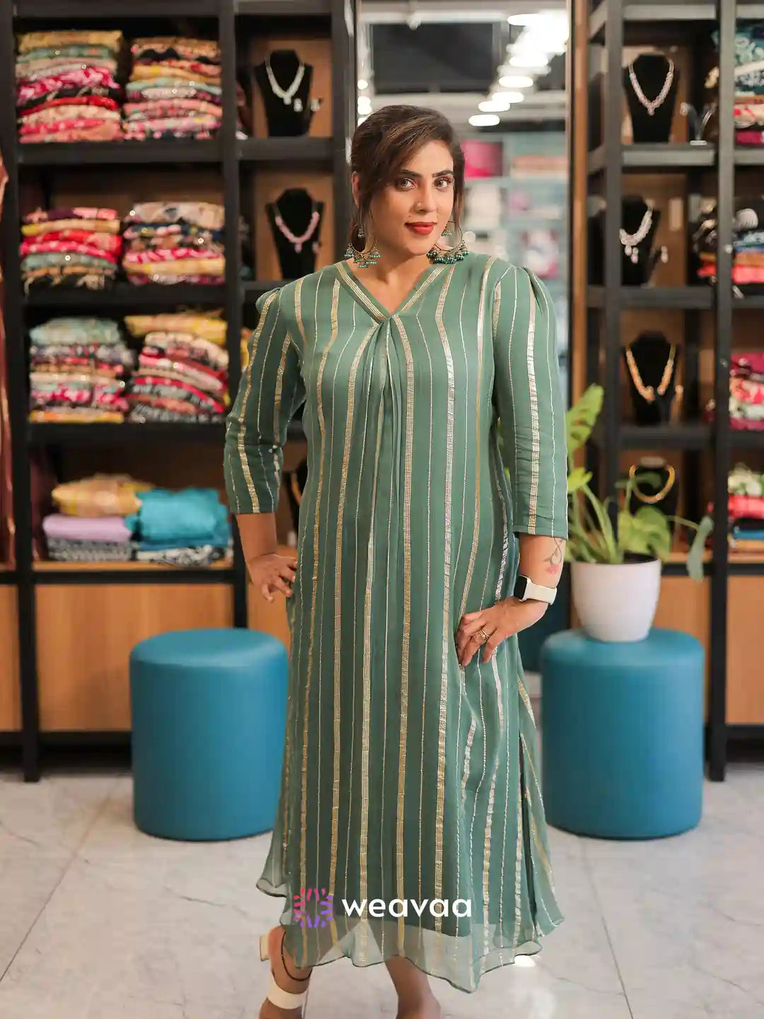 green-georgette-a-line-kurti-with-centre-pleats