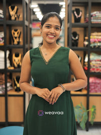 dark-green-a-line-dress-for-women-with-round-v-neck-and-hand-work-detailing