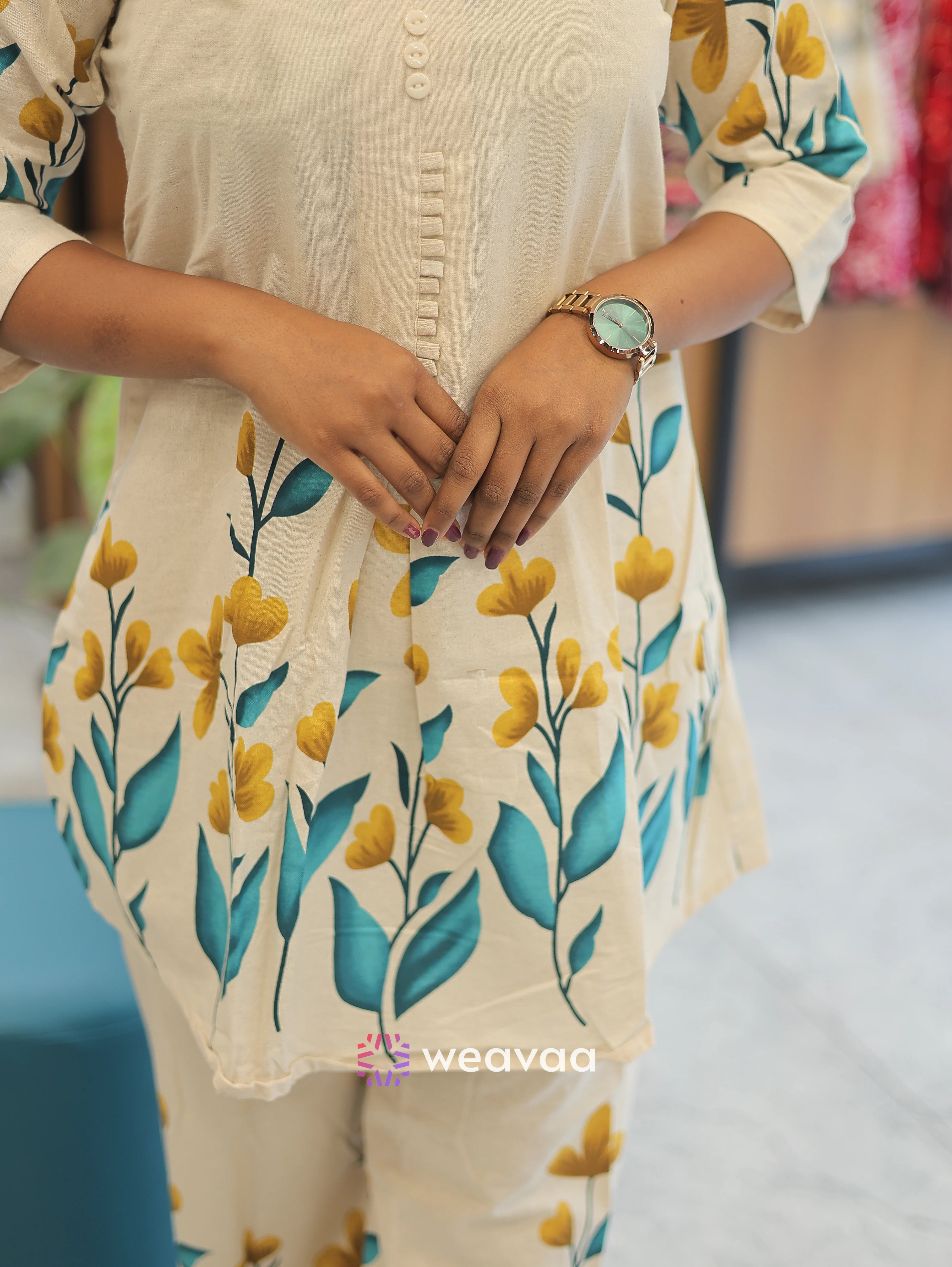 off-white-cord-set-for-women-with-yellow-floral-patterns