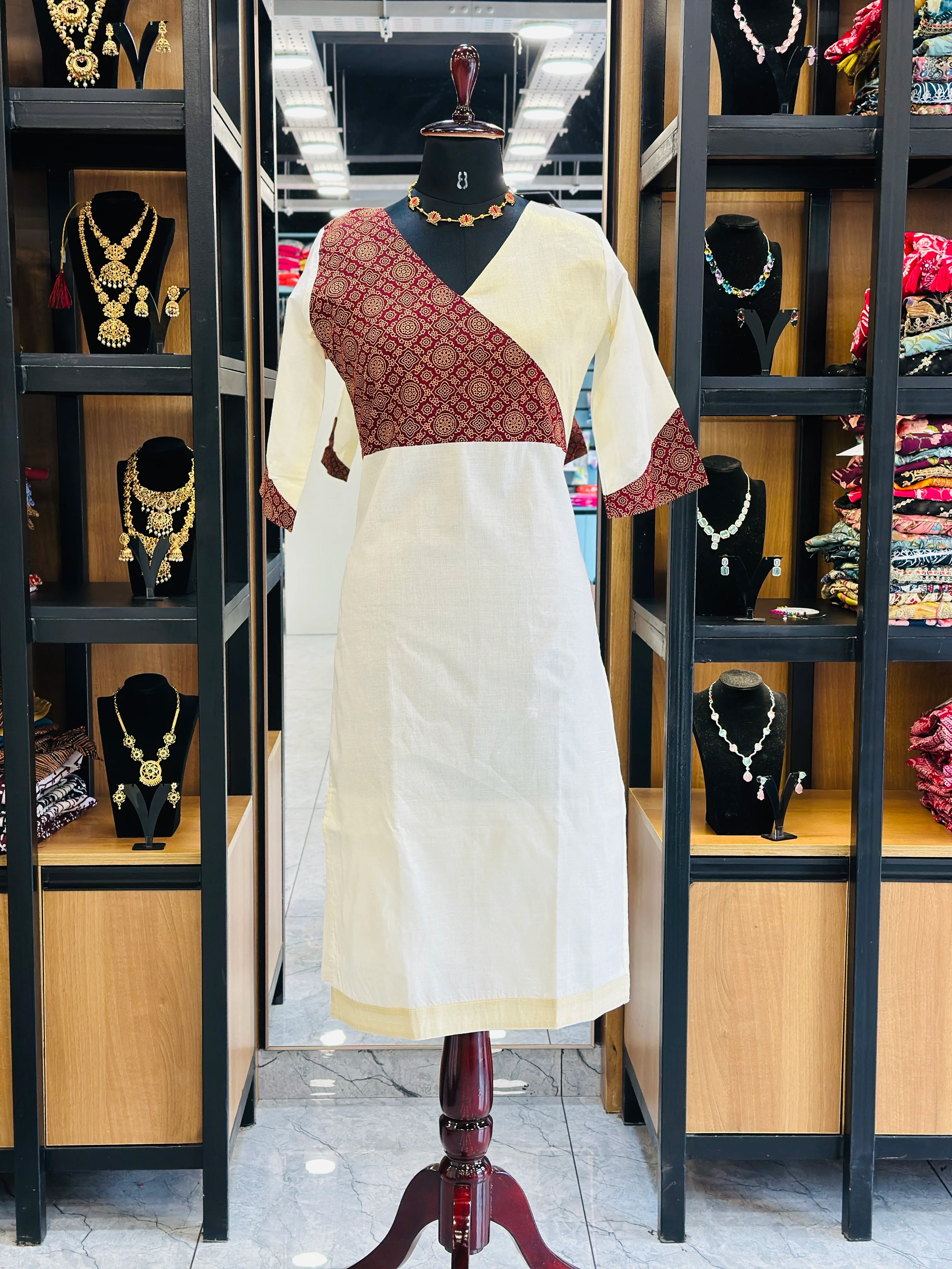 offwhite-cotton-kurta-with-half-ajrak-pattern-and-3-4-sleeves