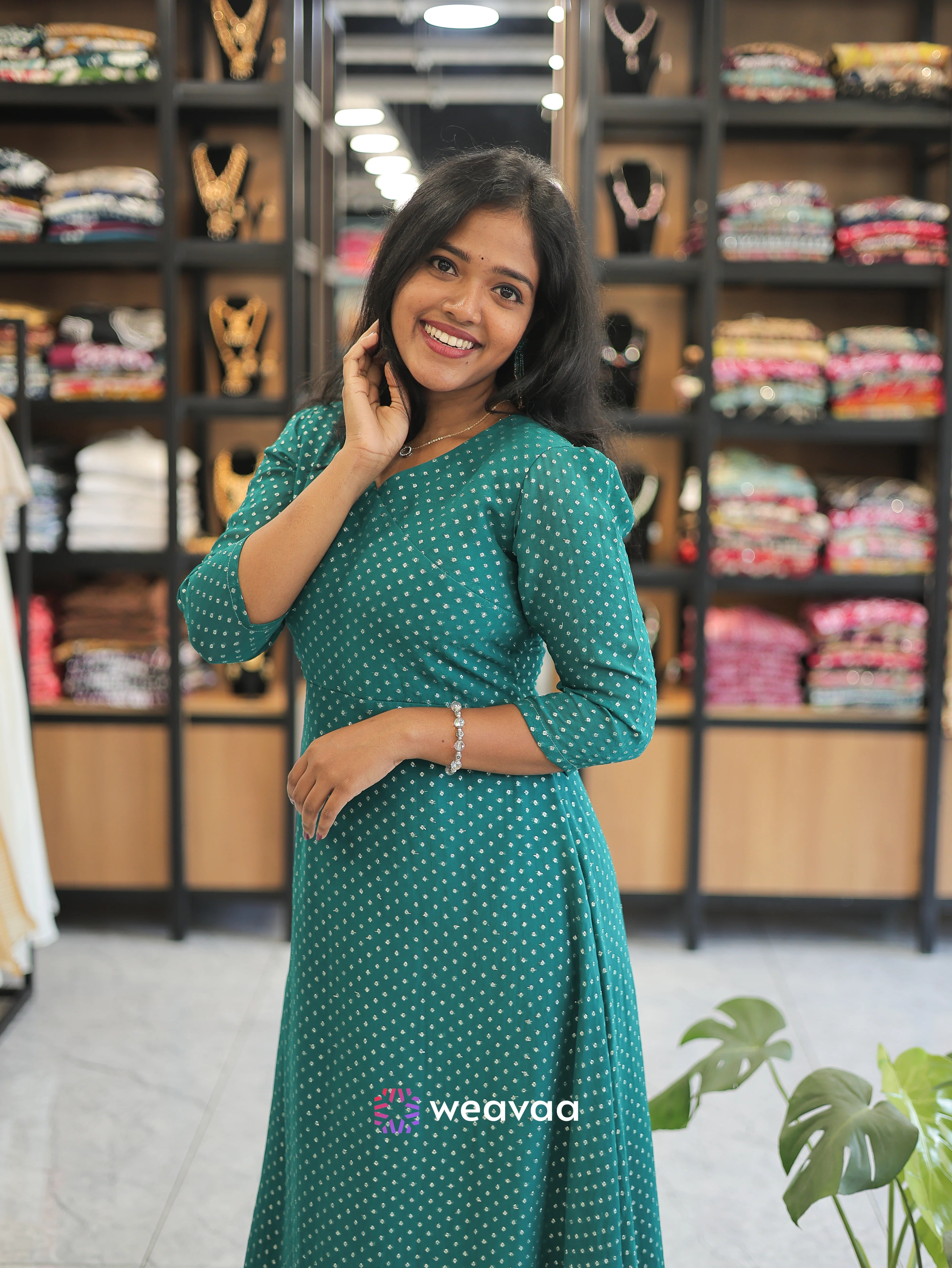 party-wear-georgette-kurti-with-stylish-umbrella-cut-in-peacock-green-color