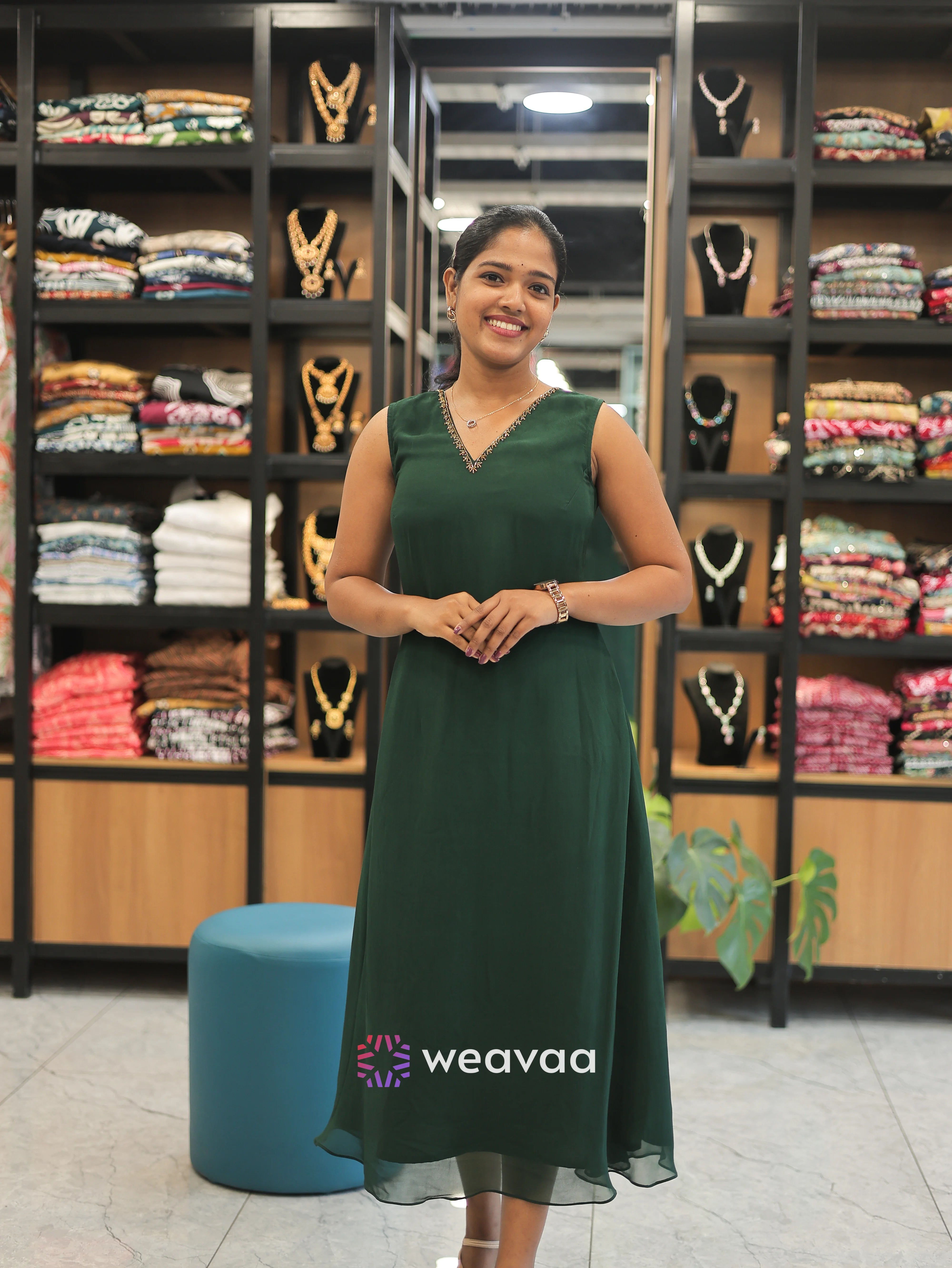 sleeveless-party-wear-dress-for-women-in-dark-green-georgette-a-line-style
